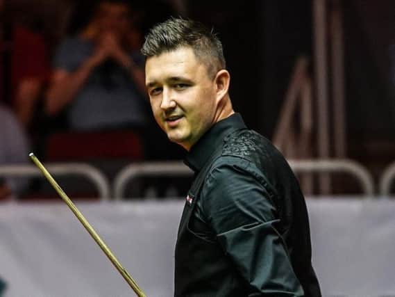 Kettering's Kyren Wilson is through to the quarter-finals of the Betfred World Championship