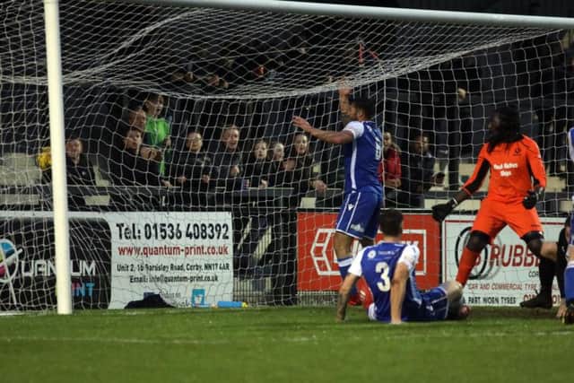 The ball is in the net for Elliot Sandy's first and the Steelmen's third goal of the night at Steel Park