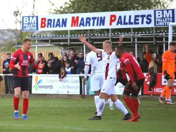Brett Solkhon celebrates after he scored Kettering Town's equaliser against Weymouth in the Evo-Stik League South Premier Division Championship Match at Latimer Park. Pictures by Peter Short