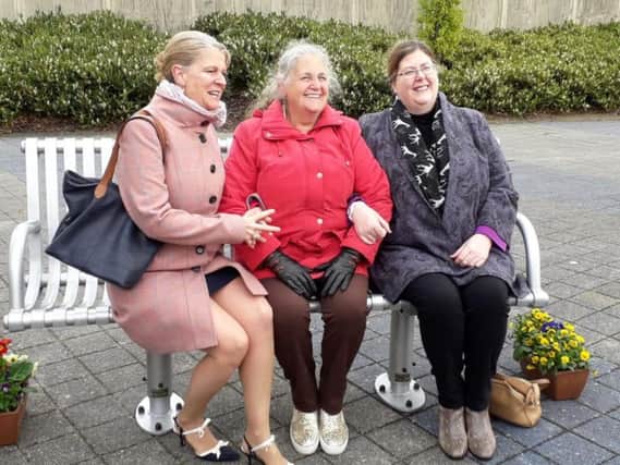 Betty Wade (Centre) was present at the bench dedication. Picture with thanks to David Fursdon.