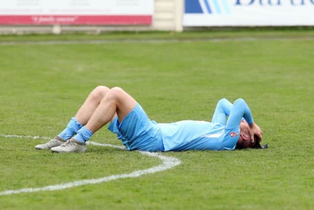 Elliot Sandy's devastation was plain to see after the final whistle on Bank Holiday Monday. Picture by Alison Bagley