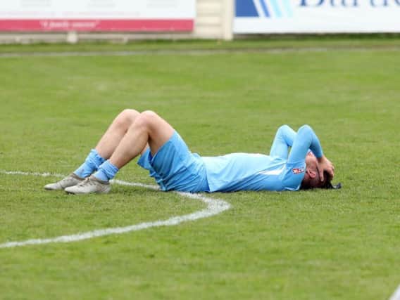 Elliot Sandy's devastation was plain to see after the final whistle on Bank Holiday Monday. Picture by Alison Bagley
