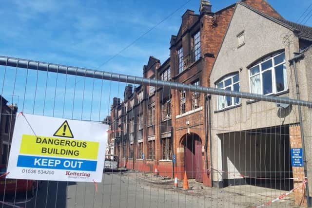 The road remains cordoned off.