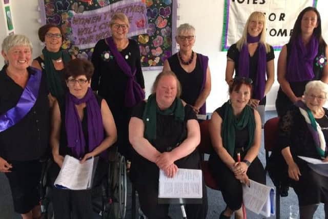 The Votes and Voices choir at last years launch of the month of womens events to celebrate the centenary of womens suffrage.
