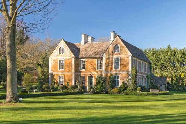 The Dower House at Rushton is currently owned by the founder of a high street clothing brand - but that could be about to change! It has eight bedrooms, a media room and a swanky converted basement.