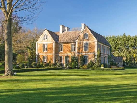 The Dower House at Rushton is currently owned by the founder of a high street clothing brand - but that could be about to change! It has eight bedrooms, a media room and a swanky converted basement.
