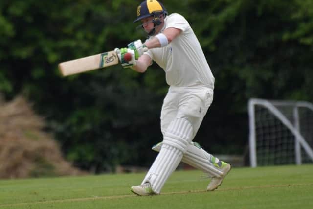 Greig Hofbauer hits out on his way to an unbeaten 114 during Finedon Dolben's win at Horton House. Pictures by Dave Ikin