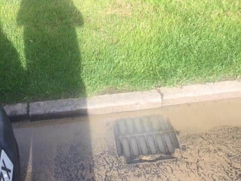 Dirty water is coming up through the surface water drains