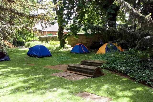 The number of tents in the grounds of St Peter and St Paul's church has increased in recent weeks.