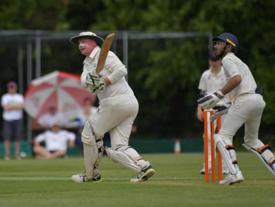 Steve Musgrave hits out on his way to 87 for Wollaston 2nd in their victory over Horton House 2nd in Division Three of the Northamptonshire Cricket League last weekend. Pictures by David Ikin