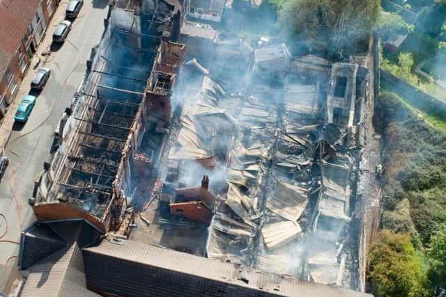Two roads closed and residents evacuated following fire at Kettering Bedding Centre building.,
Regent Street, Kettering
Monday 13 May 2019.
Picture by Terry Harris. NNL-190514-101139005