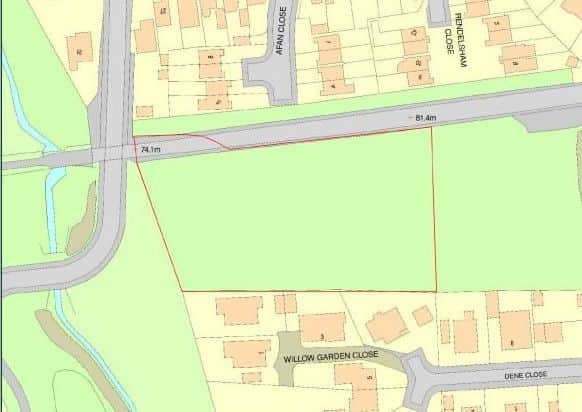 The site of the proposed homes is outlined in red.