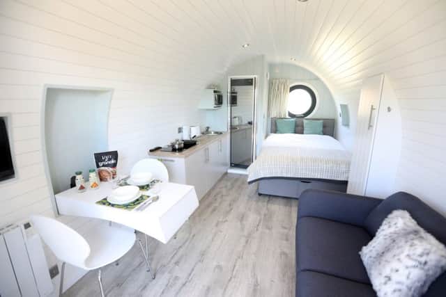 The pods have a double bed, kitchen, wet room and television.
