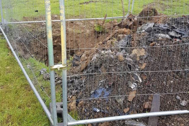 The sinkhole was full of rubbish NNL-190613-160055005