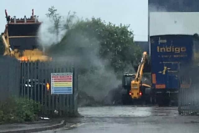One of the trucks waits ready to transport the waste away from the depot