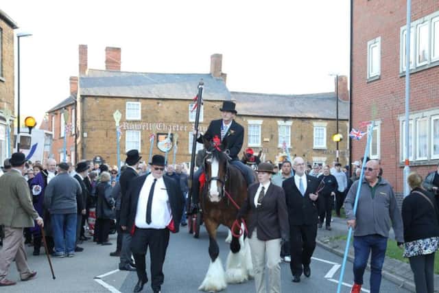 Bailiff Frank York leads the parade on horseback. Picture by Alison Bagley.