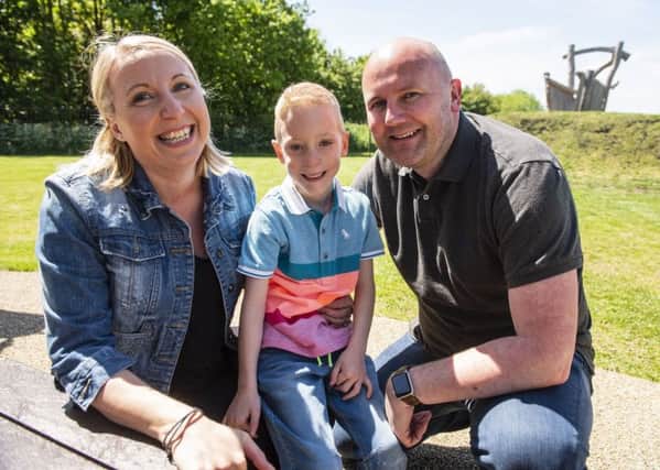 Blood donor Andrew, from Corby, meets mum Helen and recipient Sebastian