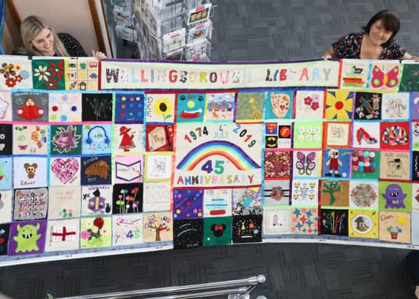 Wellingborough, Welingborough Library wall hanging to celebrate 45th anniversary of library on the Pebble Lane site.  Tuesday, June 25th 2019