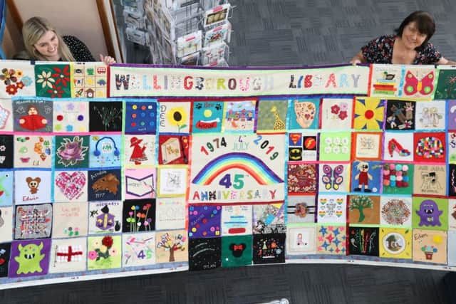 Wellingborough, Welingborough Library wall hanging to celebrate 45th anniversary of library on the Pebble Lane site. Tuesday, June 25th 2019