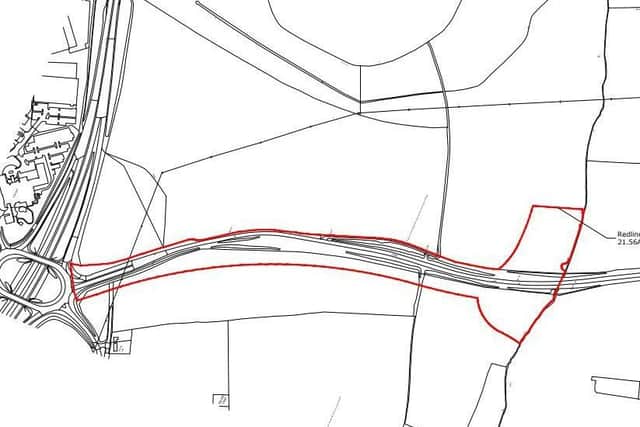 The section becoming a dual carriageway in red. The A14 roundabout is to the left.