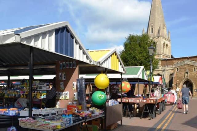 From the archive: Wellingborough Market in the shadow of  All Hallows Church