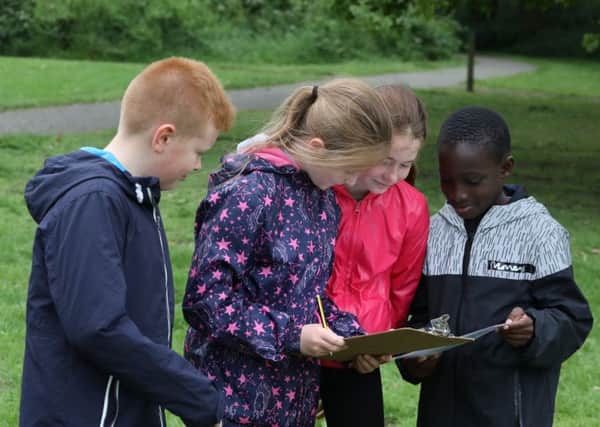 Pupils from Corby Primary Academy orienteering