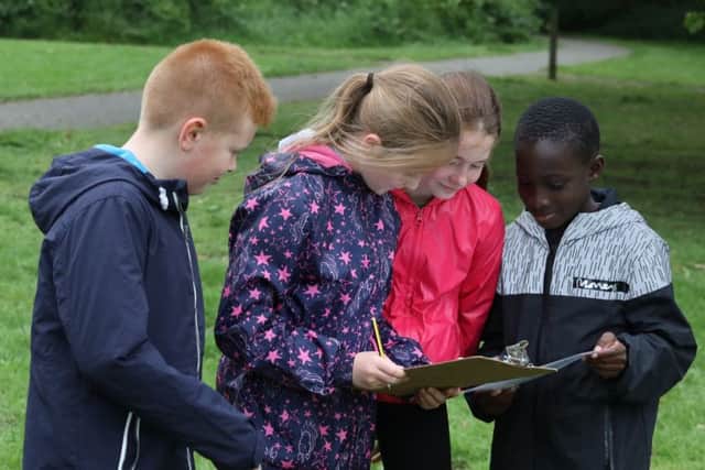 Pupils from Corby Primary Academy orienteering