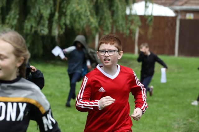Pupils from Corby Primary Academy orienteering