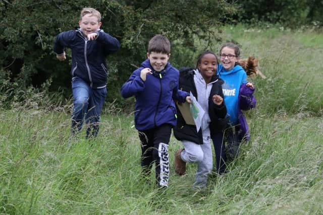 Pupils from Corby Primary Academy orienteering