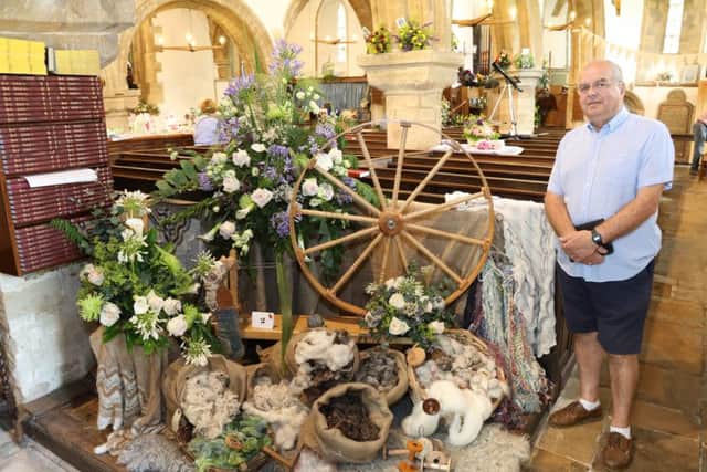 Alan Wheeler church warden of St James Church, Gretton Flower Festival