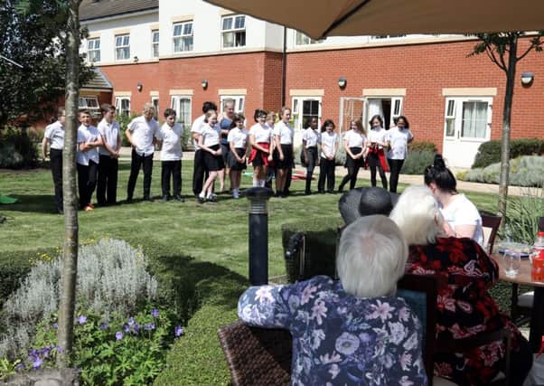 Rockingham Primary School Year 6 pupils entertain the residents and guests.  Friday, June 28