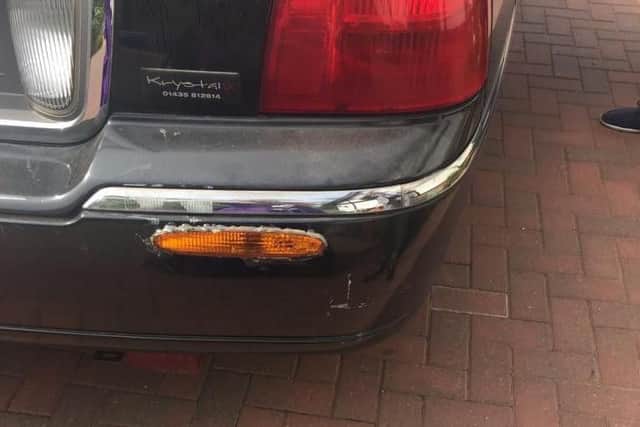 The vehicle had signs of accident damage.