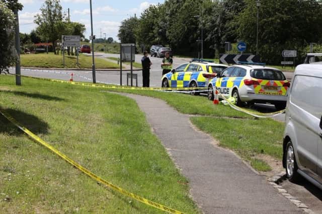 Police in Little Harrowden after the incident on June 21