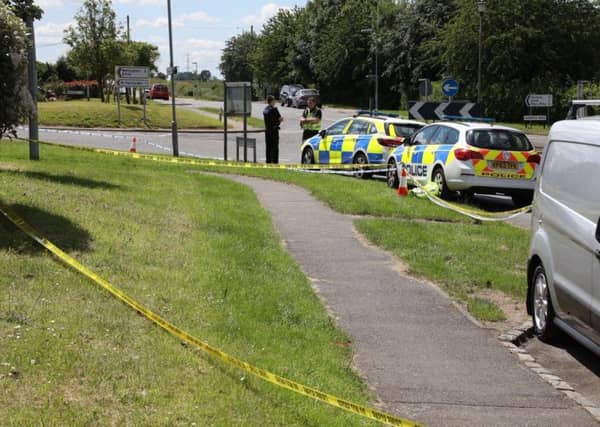Police in Little Harrowden after the incident on June 21