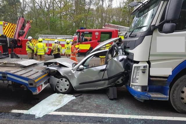 The car was crushed between two lorries on the M1 near Northampton. Photo: Northamptonshire Police