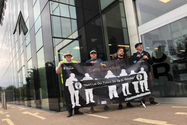 Some of the protestors outside the Corby Cube