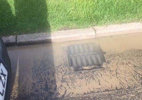Sewage coming up through the drains at Stephenson Way