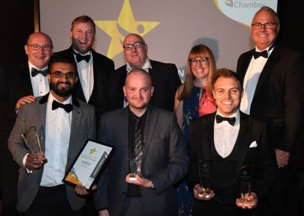 Parm Bhangal, Allen Tew and Nathan Taylor-Allkins with their awards and the awards sponsors.