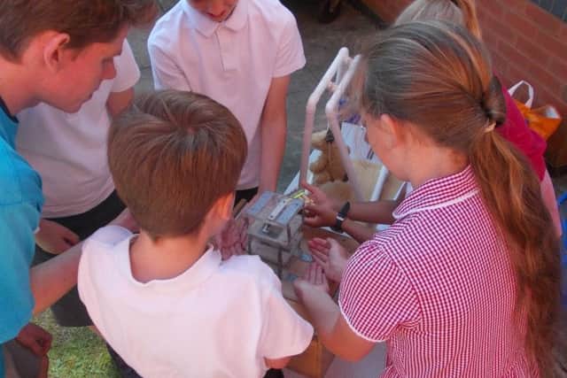 The CHaOS roadshow in Irchester was run by ten Cambridge University students NNL-191207-131059005