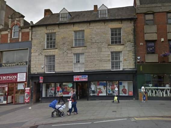 The attack was in the alleyway between Timpson's and McDonalds on Drapery, Northampton. Photo: Google