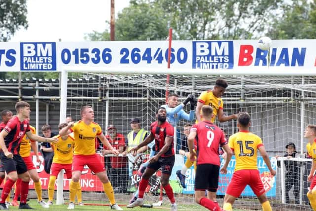 Goalmouth action from the friendly between Kettering Town and a Northampton Town XI