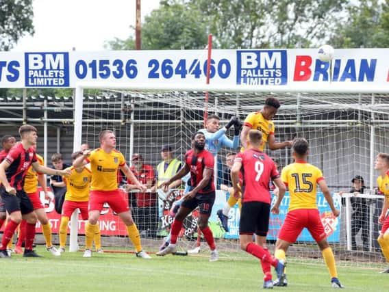 Goalmouth action from the friendly between Kettering Town and a Northampton Town XI
