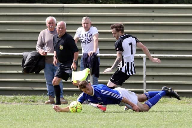 Action from the pre-season friendly between Rothwell Corinthians and Corby Town at Sergeants Lawn