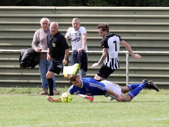 Action from the pre-season friendly between Rothwell Corinthians and Corby Town at Sergeants Lawn
