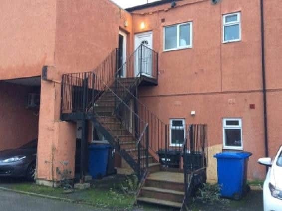 Juozas' body was found in the first-floor flat on the left.