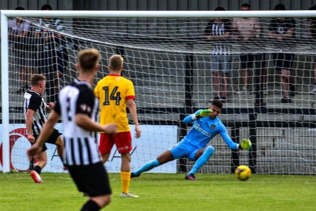 Jordon Crawford opened the scoring with this effort as Corby Town beat a Northampton Town XI in a pre-season friendly at Steel Park last week. Picture by Jim Darrah