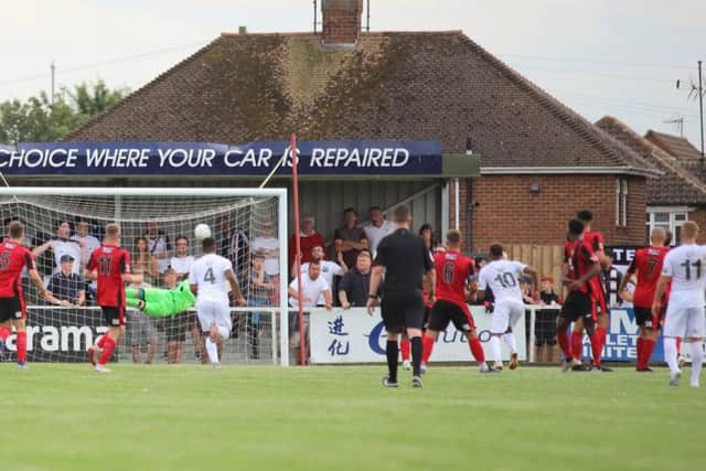 Steph Morley's fine free-kick finds the net to give AFC Telford United the lead
