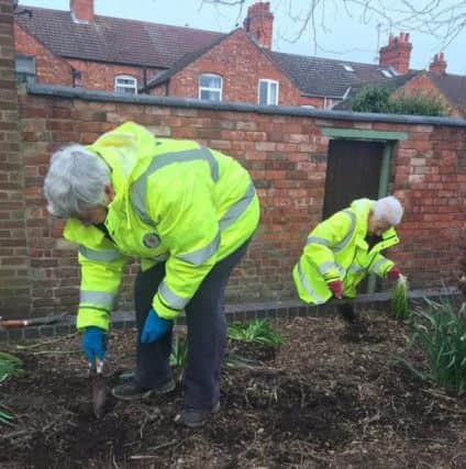 Castle Fields Streetwatch Group members working on the communal garden