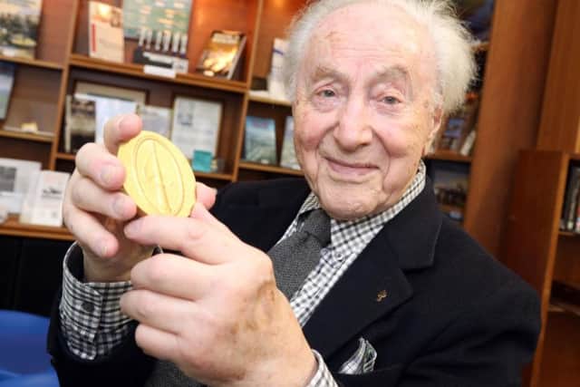 Eugene with his medal.  Pictures by Alison Bagley.