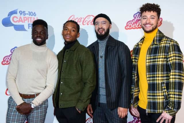 Ashley Fongho on the left with the other members of Rak-Su